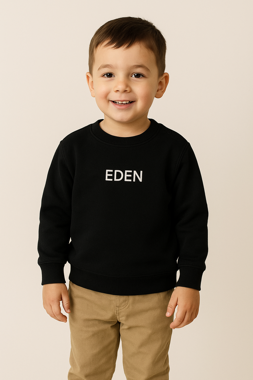 Sweater zwart met geborduurde naam